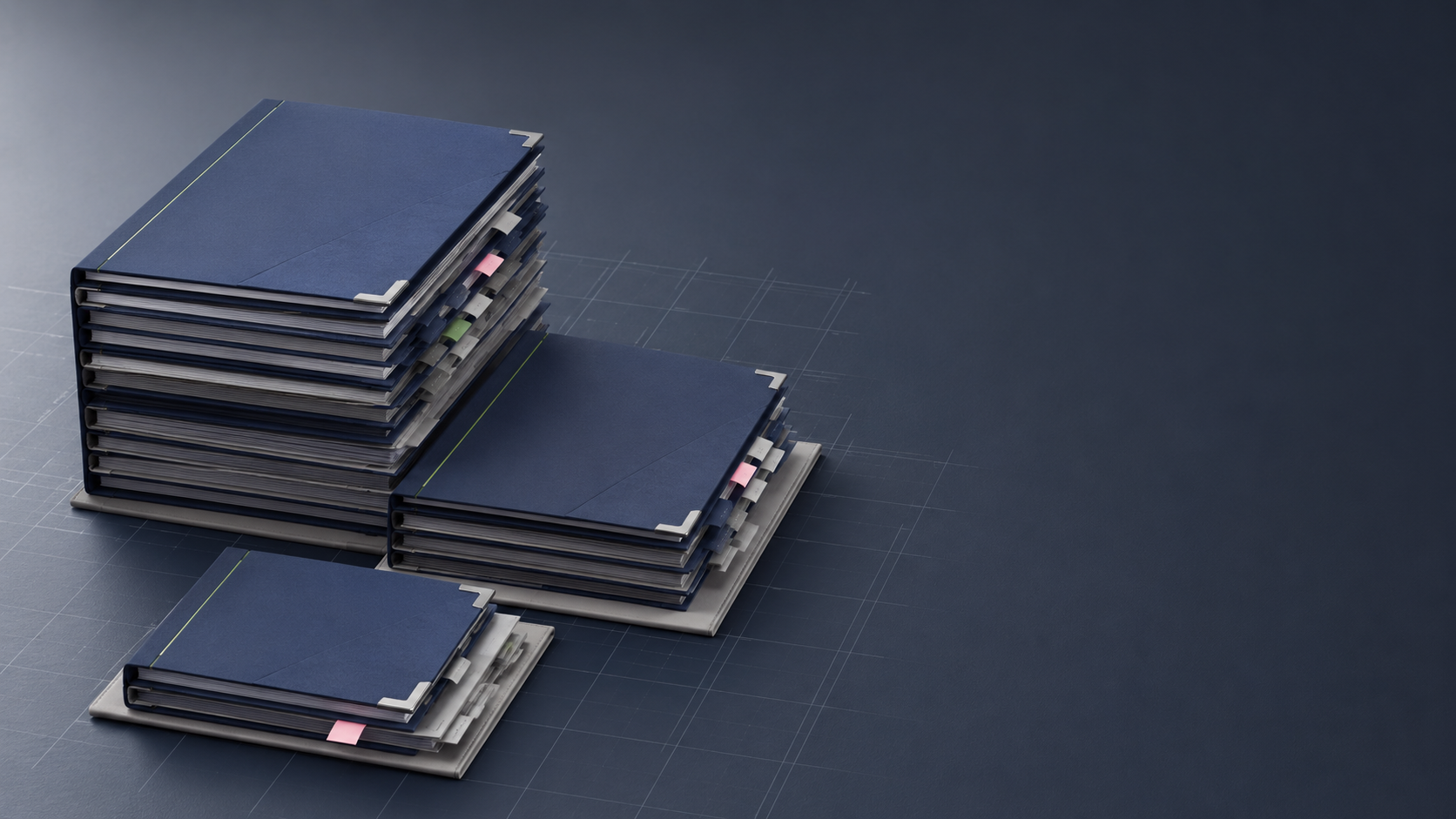 Three stacks of navy document binders arranged in descending tiers, representing the bronze, silver, and gold deployment packages